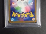 an image of a pokemon card in a plastic case