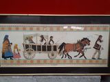 framed picture of a horse drawn carriage with people on it
