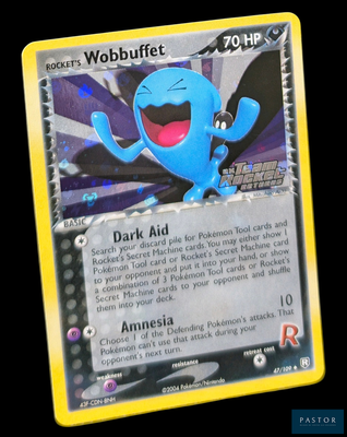 une carte Pokémon sur laquelle figure un visage bleu