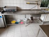 an image of a kitchen with stainless steel counter tops