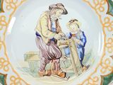 a plate with a picture of a man and a child on it