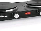 an image of a black electric stove top with two burners on it