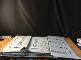 a lot of papers that are on a table