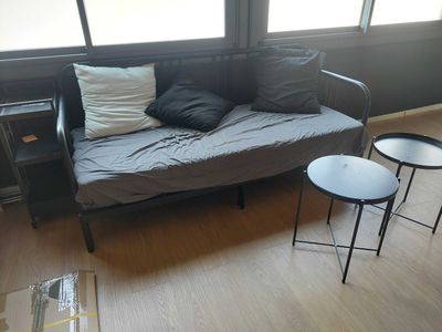 an image of a living room with a couch and a table