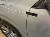 a close up of a car with a sticker on it