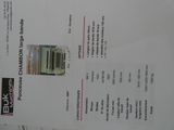 a menu with a picture of a building on it