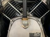 a close up of a motorcycle engine on display