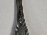 a spoon that is sitting on top of a table