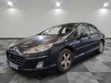 a picture of a blue car parked in a garage