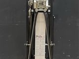 an image of a machine that is sitting in front of a wall