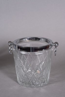 a glass ice bucket with a metal lid
