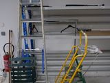 a ladder that is leaning against a wall in a garage