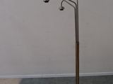 floor lamp in the shape of a lamp post with three lights