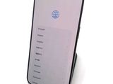 a cell phone that is sitting on top of a stand