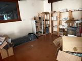 a room filled with boxes and boxes on the floor