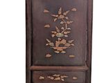 an image of a wooden cabinet with flowers and birds painted on it