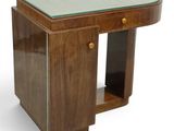 an image of a small wooden desk with a glass top