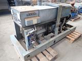 a machine that is sitting on a pallet in a warehouse