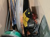 a box full of assorted items and tools in it