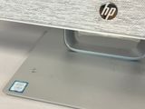 a close up of a laptop with a mouse on top of it
