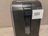 a close up of a paper shredder with a price tag on it