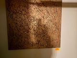 a picture of a painting hanging on a wall in a room