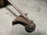 an old rusty pipe wren on the floor next to a box