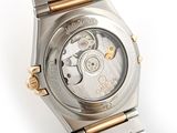 an image of a close up of a watch on a white surface