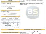 un gros plan d'un document sur lequel figure la photo d'une voiture