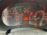 a close up of a speedometer on a car ' s dashboard
