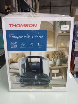 a box of a microwave on a table in a store