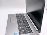 a laptop that is sitting on a white table
