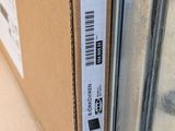 a cardboard box with a sticker on it sitting on a table