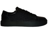 a picture of a black sneaker with a black sole