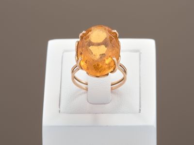 Bague en or jaune 18k 750 millièmes ornée d'une pierre jaune…