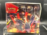 display case for a pokemon card game on a black surface