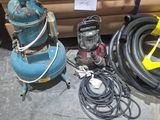 many different types of industrial equipment on the ground
