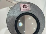 a close up of a camera lens on a table