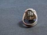 a close up of a ring with a skull on it