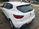 a white car that is parked in the parking lot