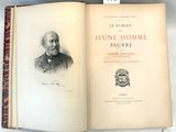 un livre sur lequel figure la photo d'un homme en costume-cravate