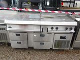a lot of stainless steel appliances that are on the ground