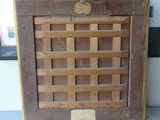 a picture of a wooden frame with a picture on it