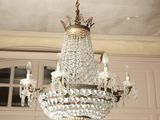 a chandelier hanging from the ceiling in a room