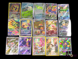 a lot of different pokemon cards on the table