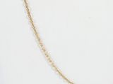 a close up of a gold chain necklace on a mannequin mannequin mannequin mannequin mannequin mannequin mannequin mann