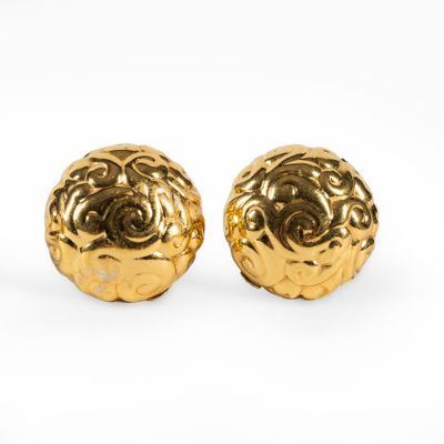 pair of gold plated earrings on white background