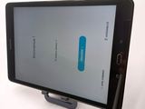 samsung galaxy note 2 with a blue button on the screen