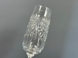 a wine glass that is sitting on a table