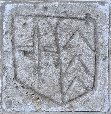 an image of a stone block with a coat of arms on it
